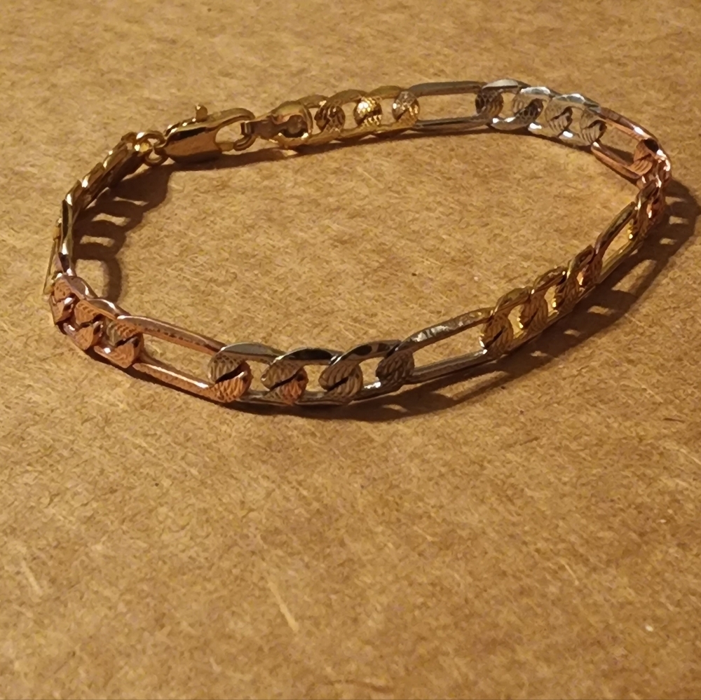 14kgold plated gold,rose gold, silver multi bracelet